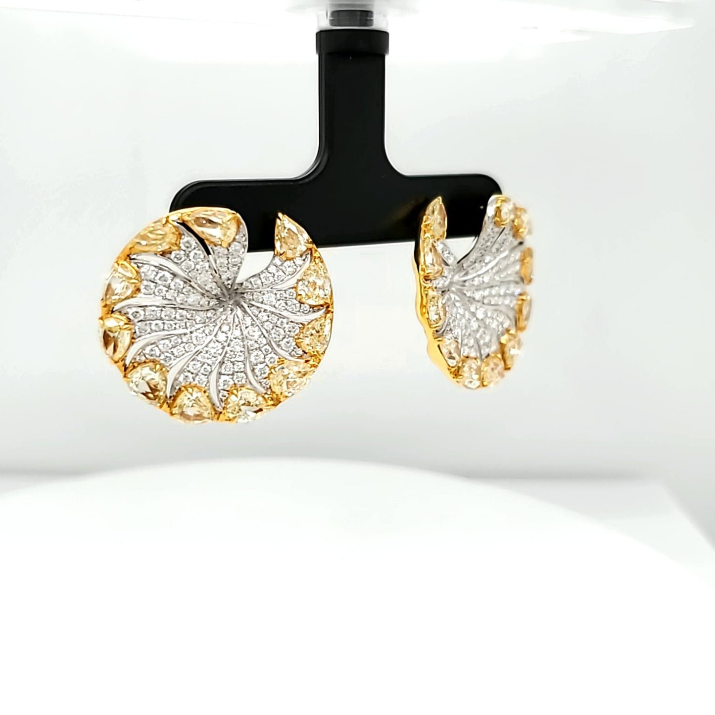Natural Diamond Round and Fancy Yellow Pear Shaped Diamonds, in Yellow Gold
