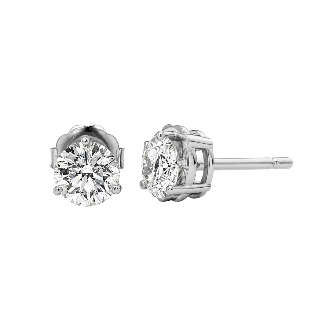 Pair of diamond stud earrings on a white background