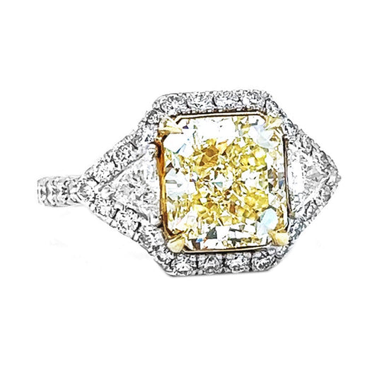 Natural Radiant Cut Fancy Yellow Diamond with Triangle Cut Diamond Halo Ring, in White Gold