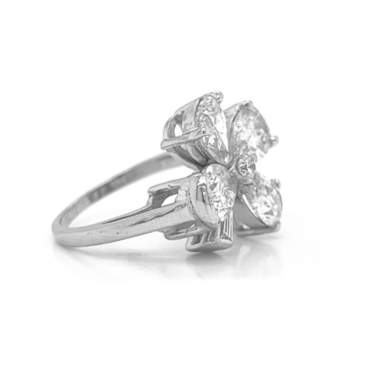 Natural Mined Pear Shaped Baguette, and Round Four Leaf Cocktail Ring Platinum