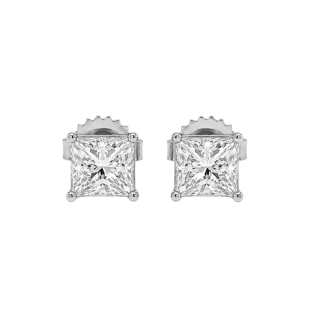 Pair of diamond stud earrings on a white background