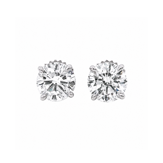 Pair of diamond stud earrings on a white background