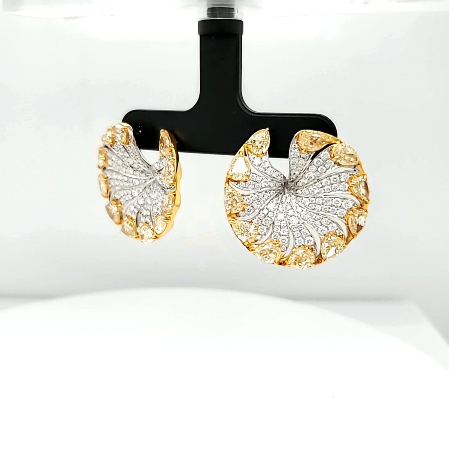Natural Diamond Round and Fancy Yellow Pear Shaped Diamonds, in Yellow Gold