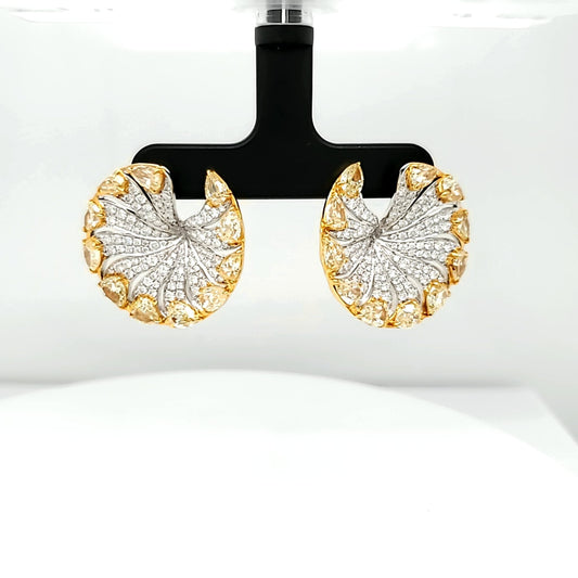 Natural Diamond Round and Fancy Yellow Pear Shaped Diamonds, in Yellow Gold