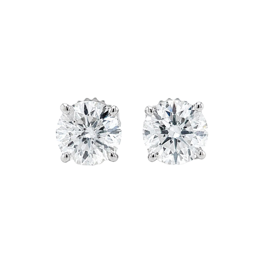 Pair of diamond stud earrings on a white background front