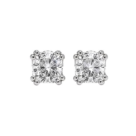 Pair of diamond stud earrings on a white background