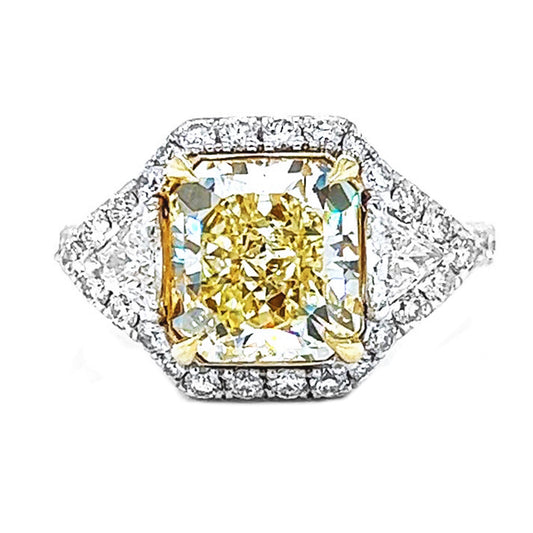 Natural Radiant Cut Fancy Yellow Diamond with Triangle Cut Diamond Halo Ring, in White Gold