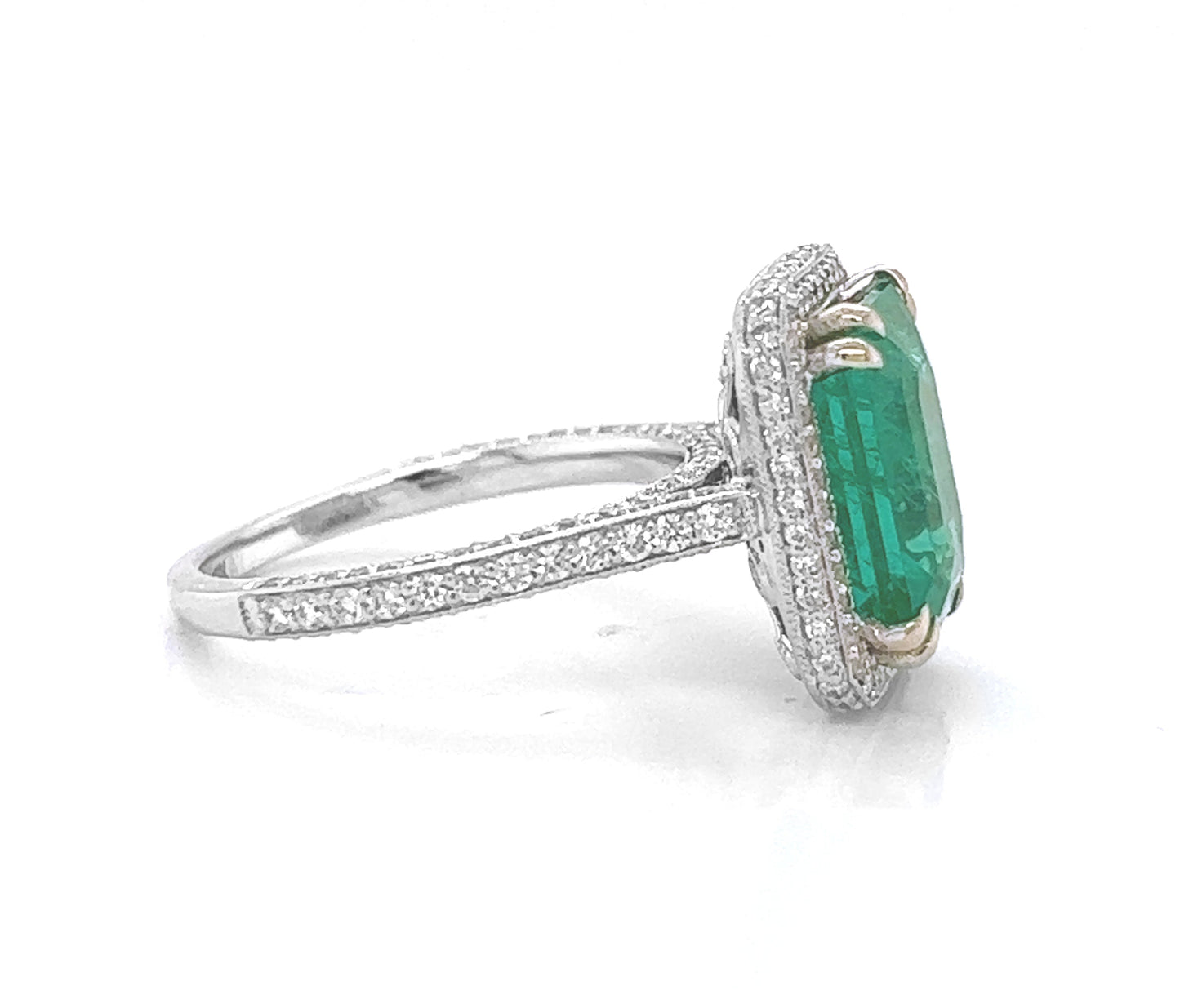 5 Carat Natural Mined Green Emerald with Natural Mined 1.10 Carat Round Diamonds 18KT White Gold Ring