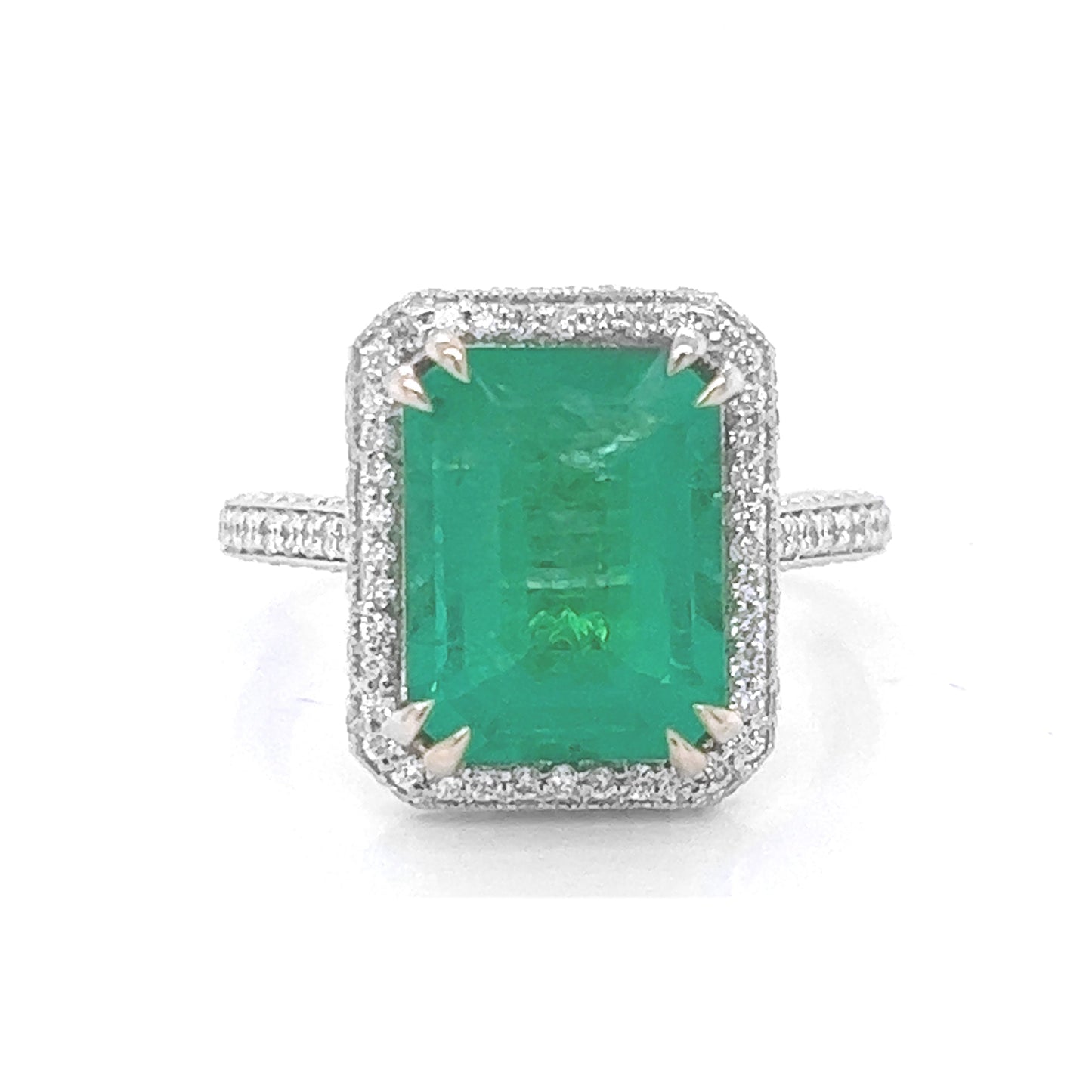 5 Carat Natural Mined Green Emerald with Natural Mined 1.10 Carat Round Diamonds 18KT White Gold Ring