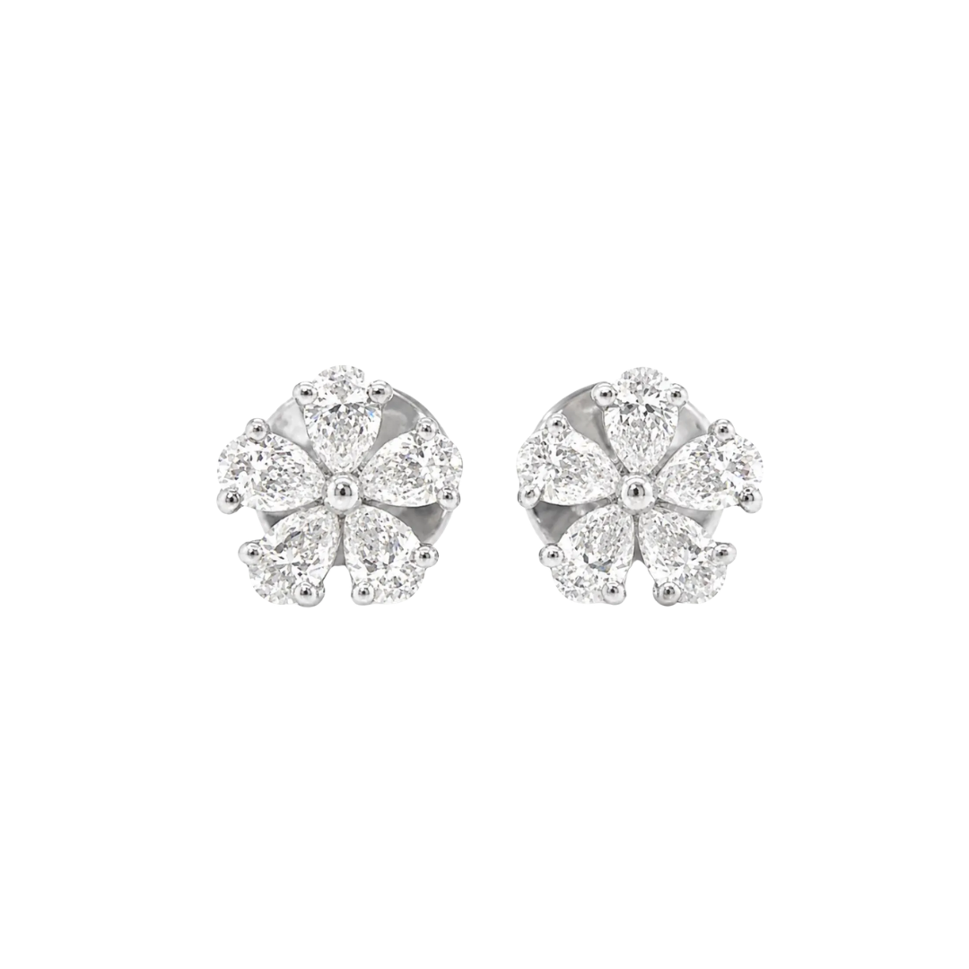 Pair of diamond stud earrings on a white background