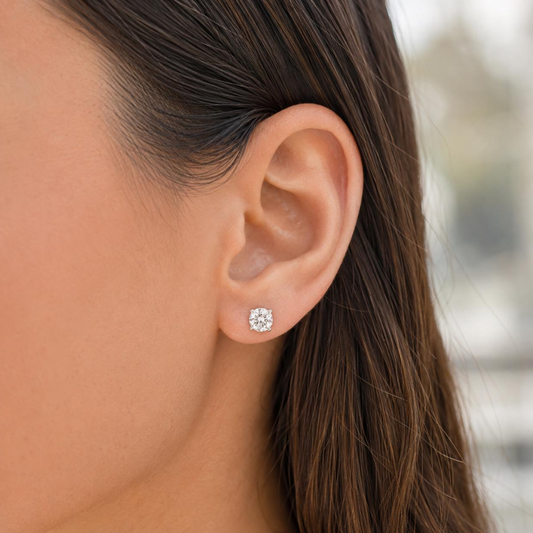 1.31 ct.tw. diamond stud earrings on model