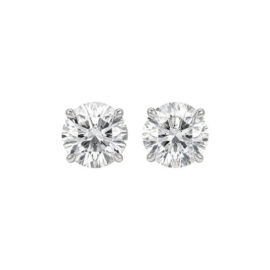 Pair of diamond stud earrings on a white background