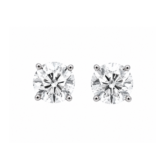 Pair of diamond stud earrings on a white background